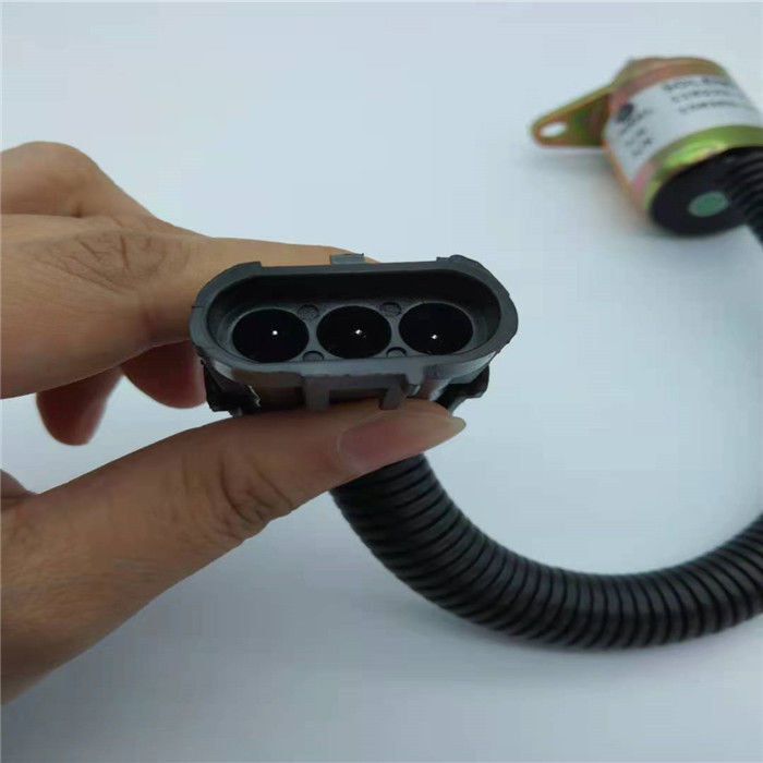 1503ES-12S5SUC12S 12V cabe el solenoide apagado combustible de la válvula electromagnética 119233-77933 de la parada de Yanmar